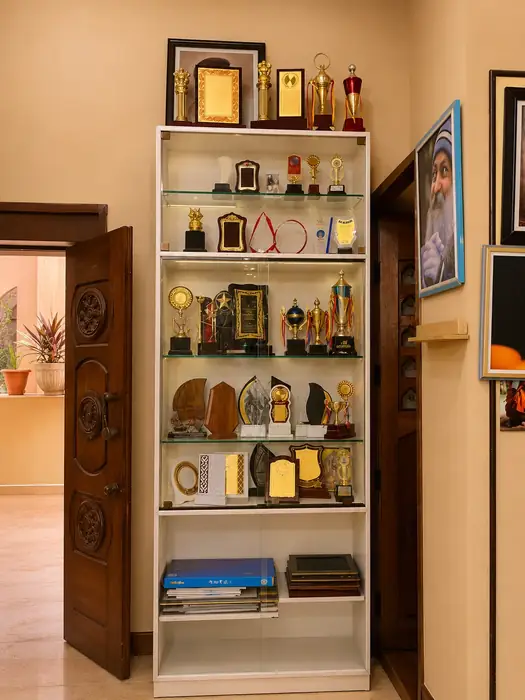 Awards and trophies showcase inside Sri Sai Photo Laminations showroom